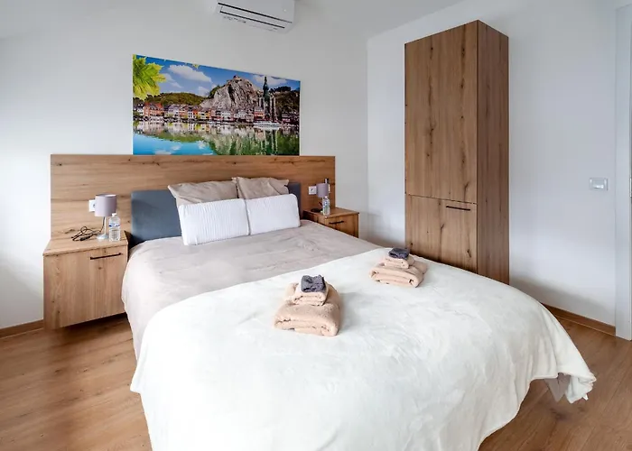 Nomad - Vue Collegiale * Dinant